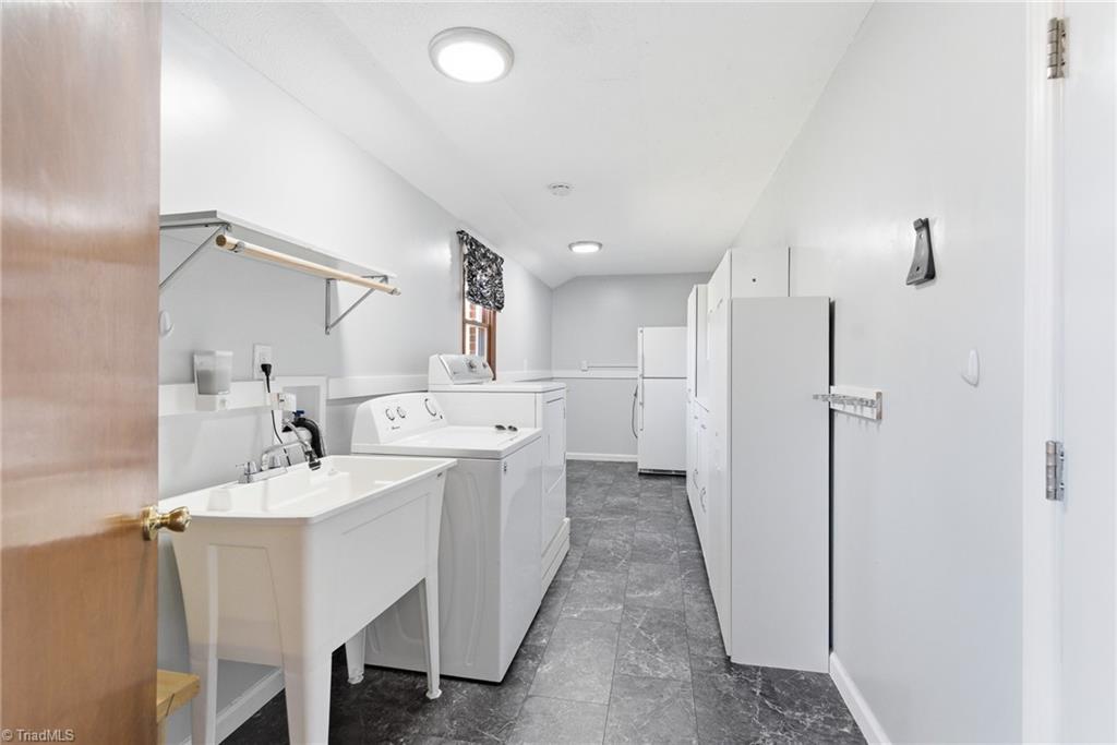 519 Riverside Drive Burlington, NC 27217 - Photo 23 of 39 Laundry room with washer, dryer and extra fridge
