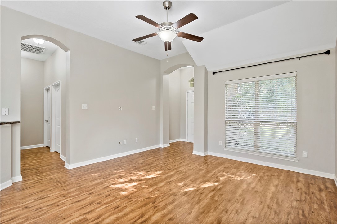 15427 Baker Meadow Loop College Station, TX 77845 - Photo 7 of 21 wooden floor in an empty room with a window