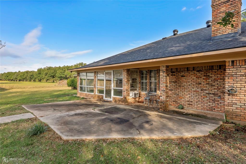 5425 Modica Lott Road Bossier City, LA 71111 - Photo 8 of 31 a view of a house with backyard and sitting area