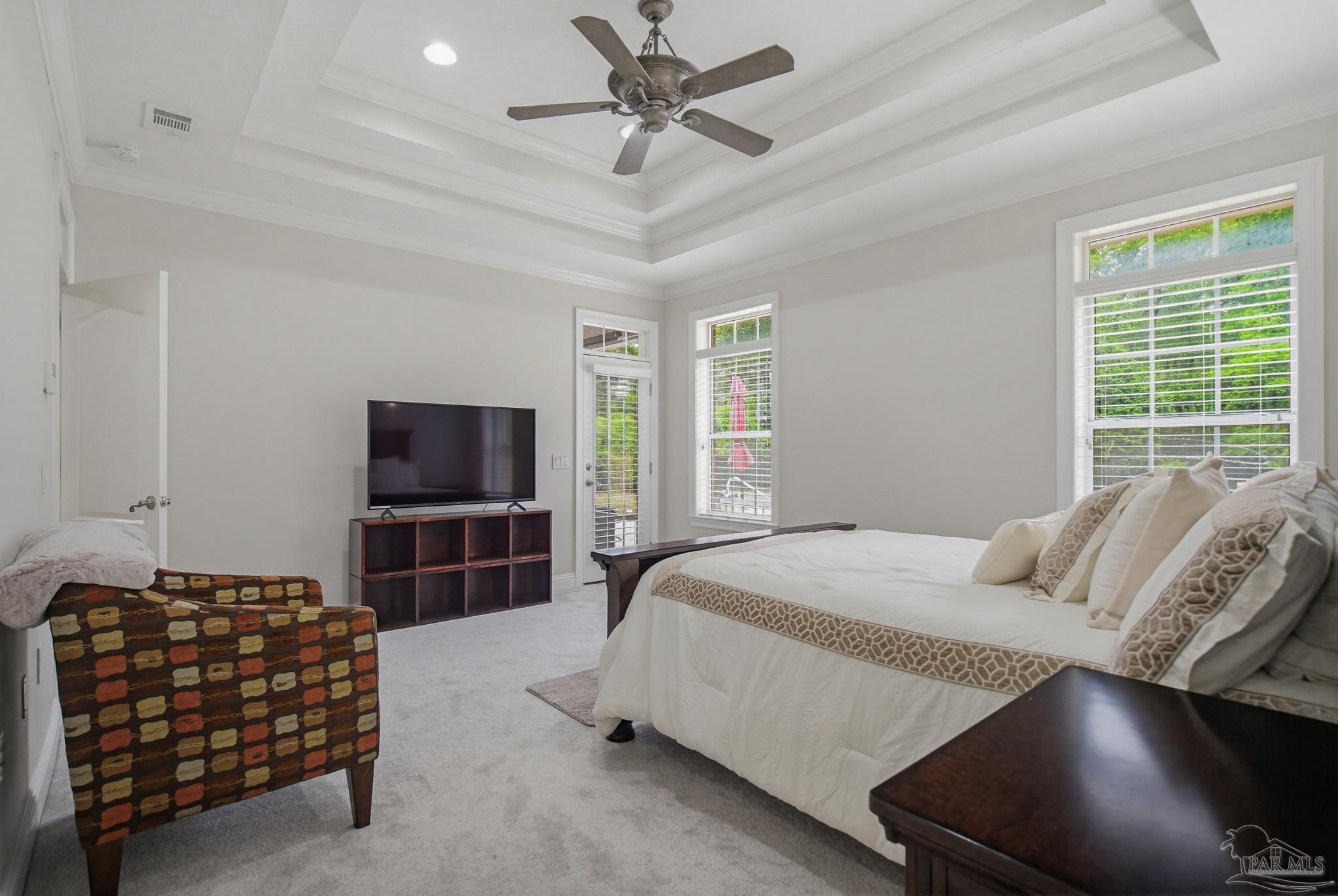 2855 Walling Road Milton, FL 32570 - Photo 28 of 55 a bedroom with a bed and a television