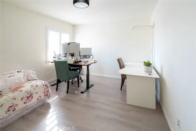 a workspace with furniture and window