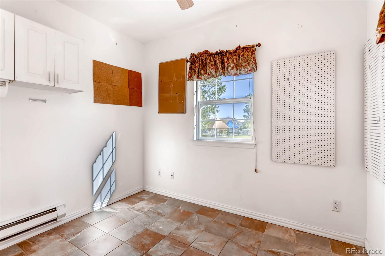 8300 Fairmount Drive, Unit N101 Denver, CO 80247 - Photo 23 of 27 a view of a storage & utility room