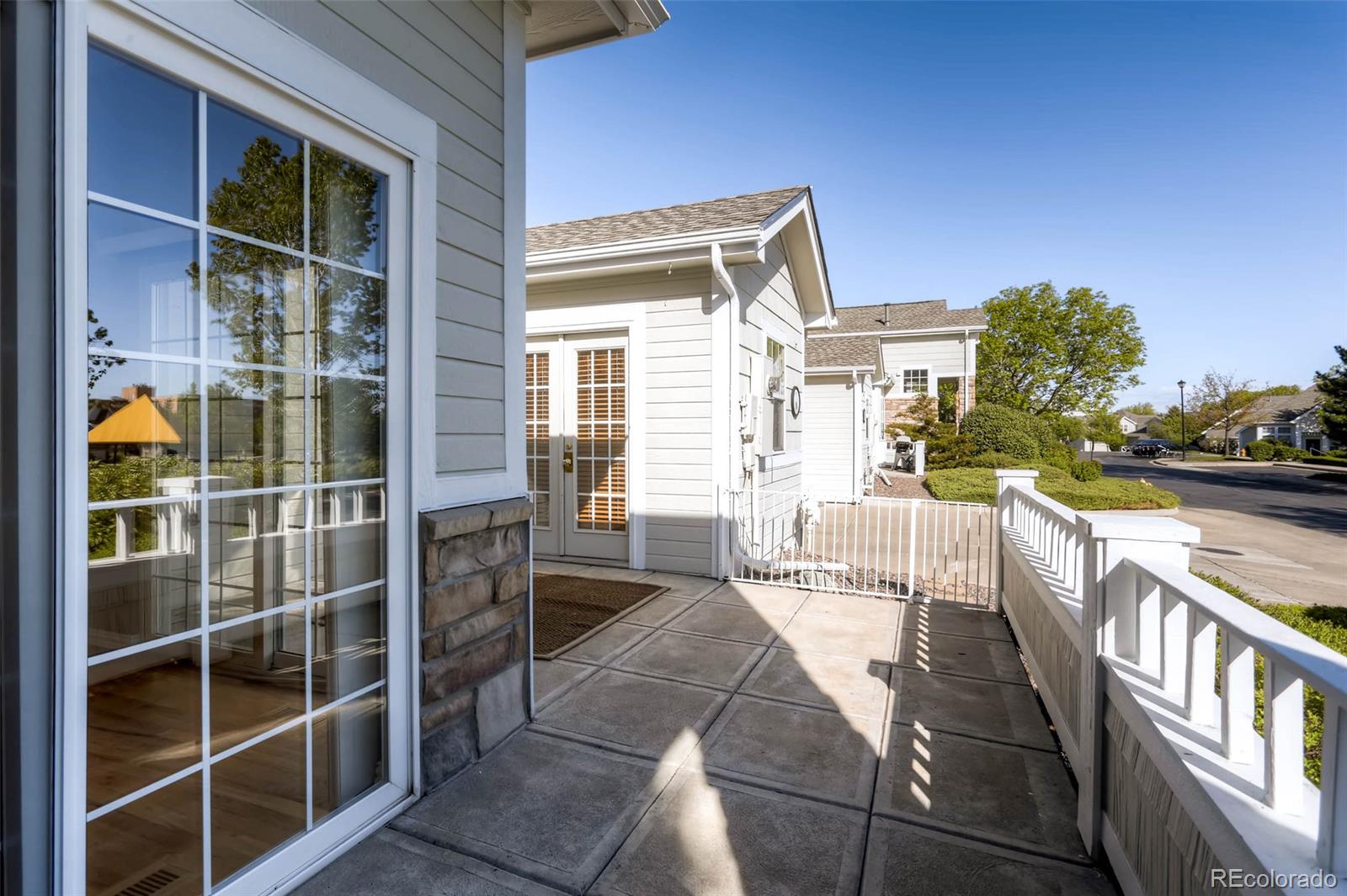 8300 Fairmount Drive, Unit N101 Denver, CO 80247 - Photo 27 of 27 a view of a balcony with chairs
