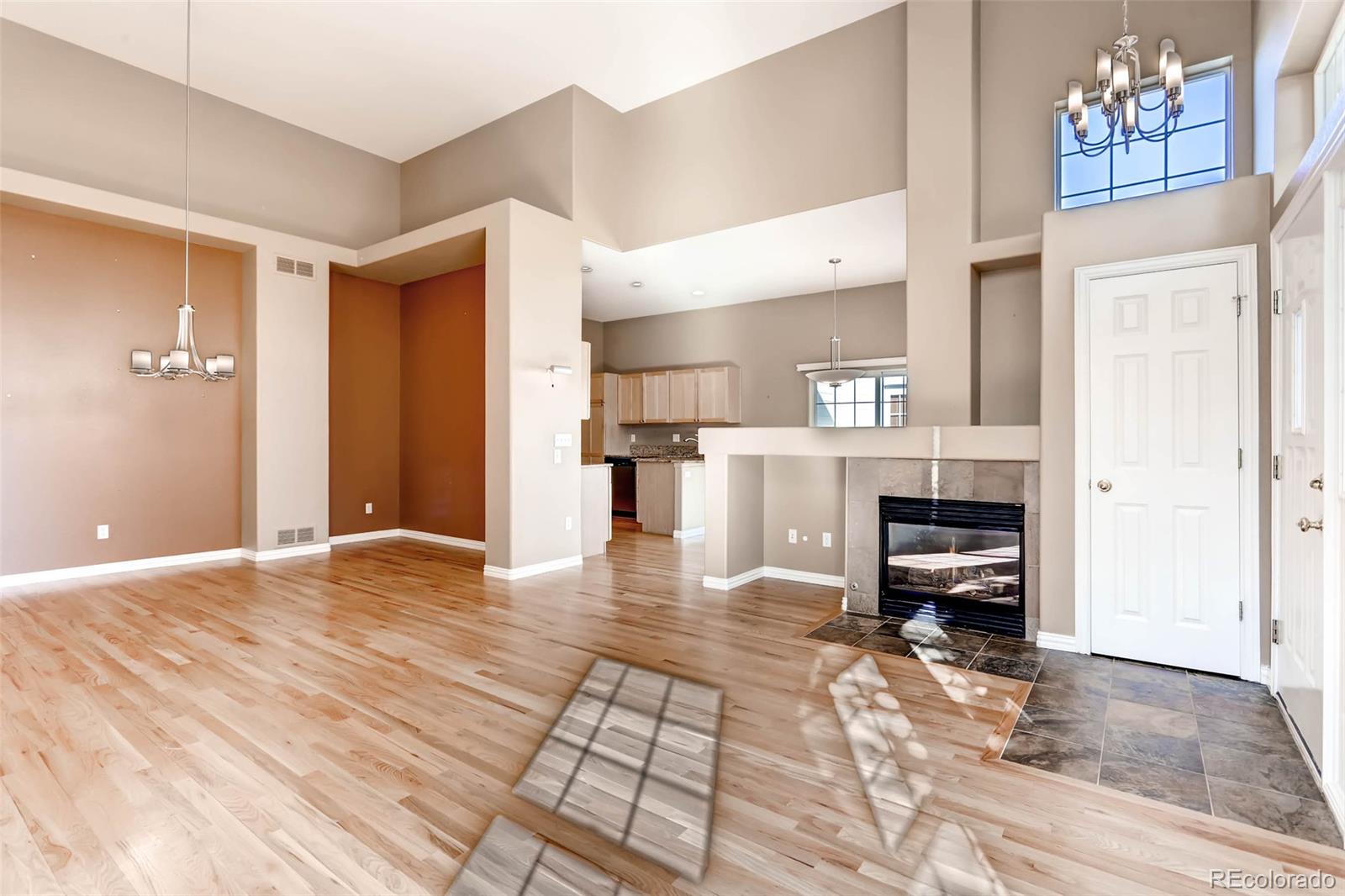 8300 Fairmount Drive, Unit N101 Denver, CO 80247 - Photo 4 of 27 a view of kitchen with furniture and refrigerator