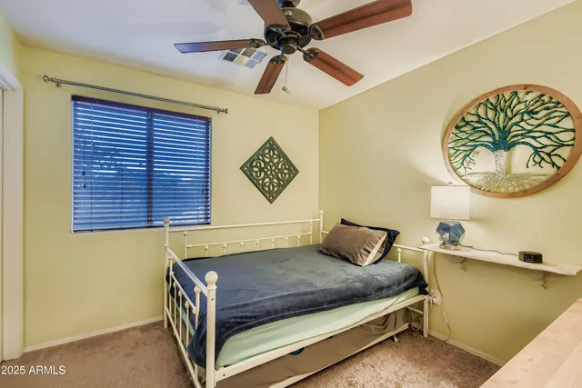 a kitchen with a refrigerator and a sink