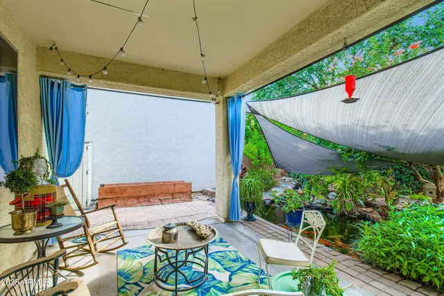 a view of a backyard with plants