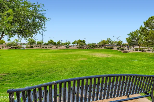 a view of a swimming pool with patio