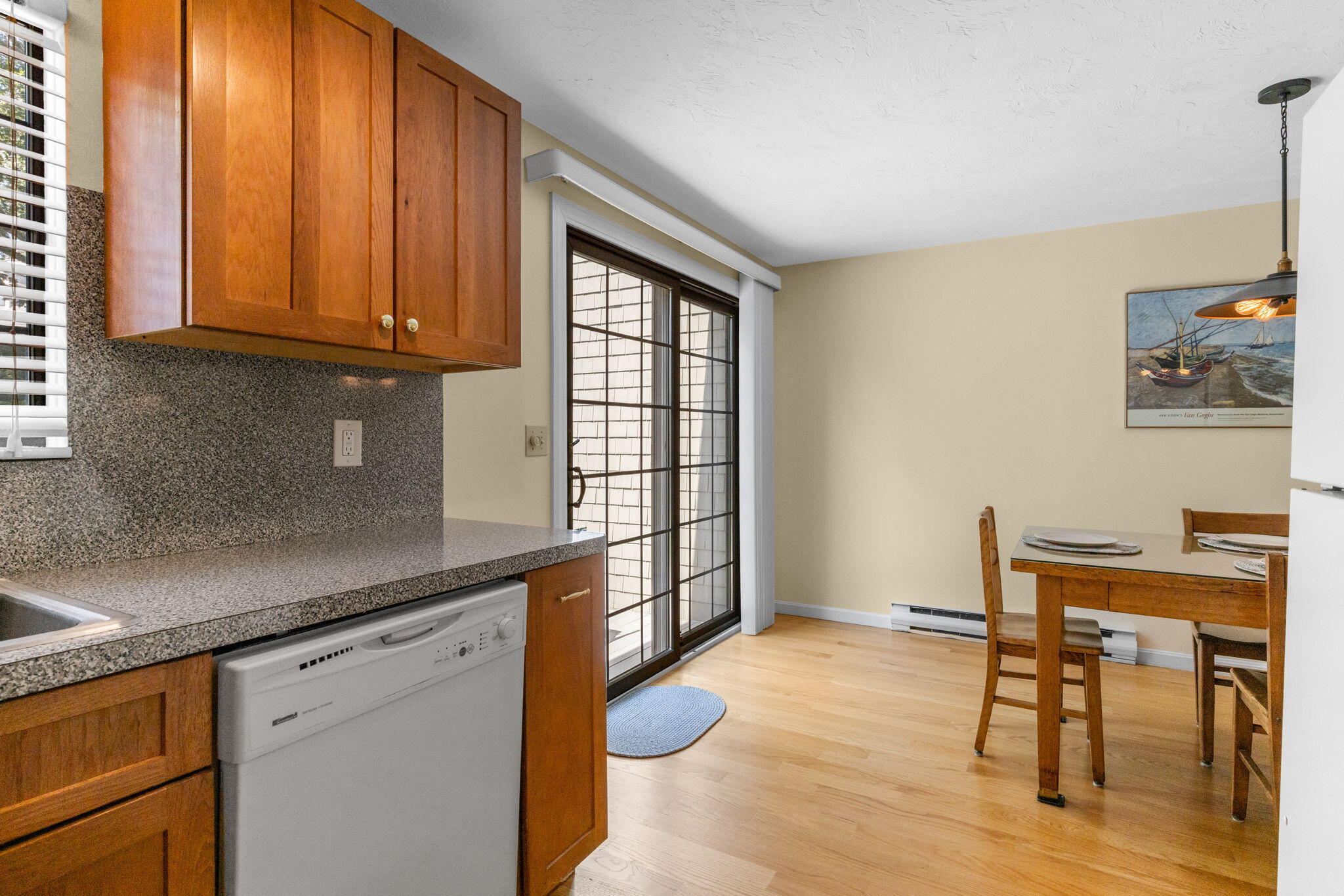 45 West Road, Unit 1E Orleans, MA 02653 - Photo 15 of 37 a kitchen with stainless steel appliances granite countertop a sink and cabinets