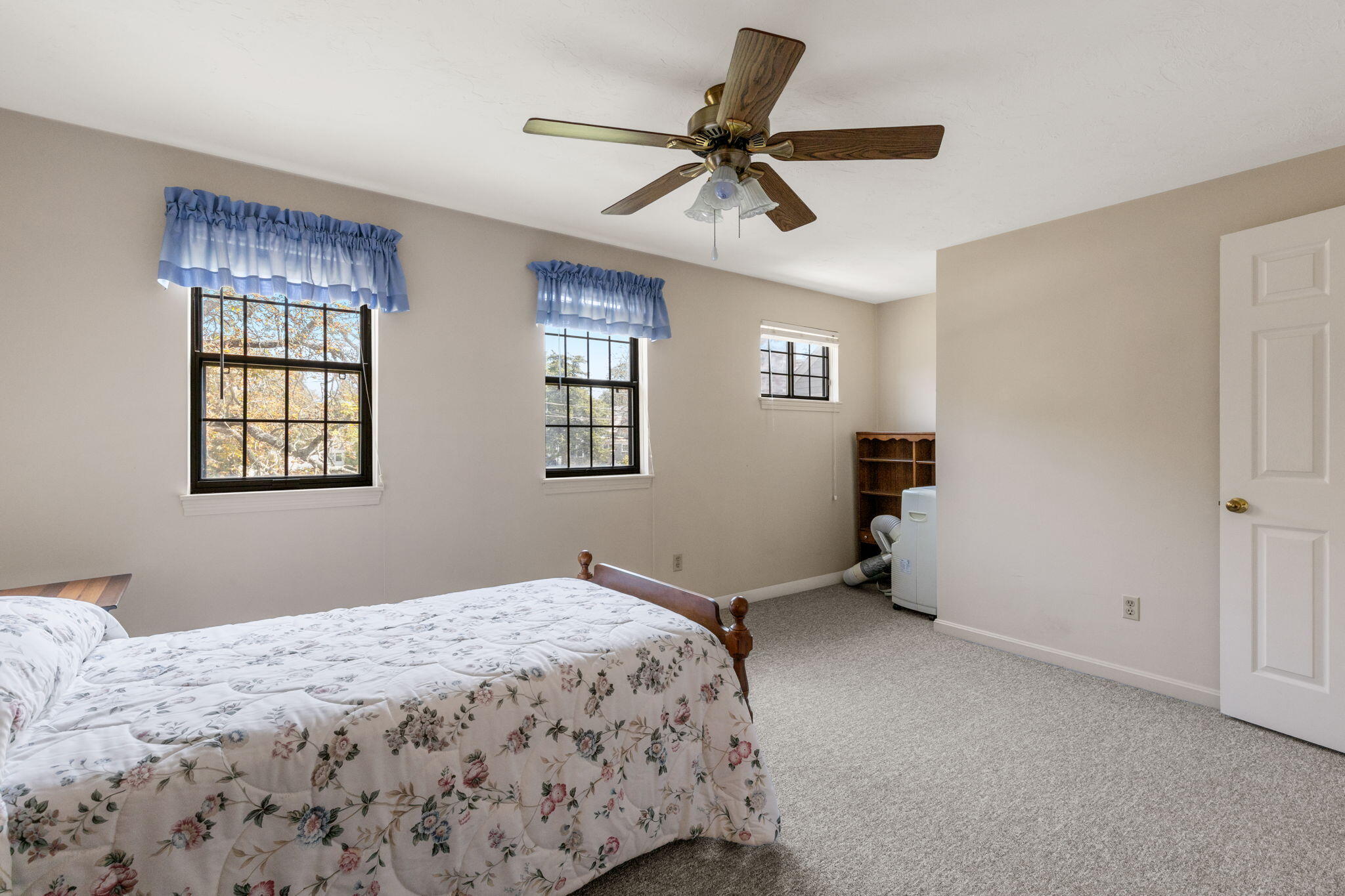 45 West Road, Unit 1E Orleans, MA 02653 - Photo 21 of 37 a bedroom with a bed and a window