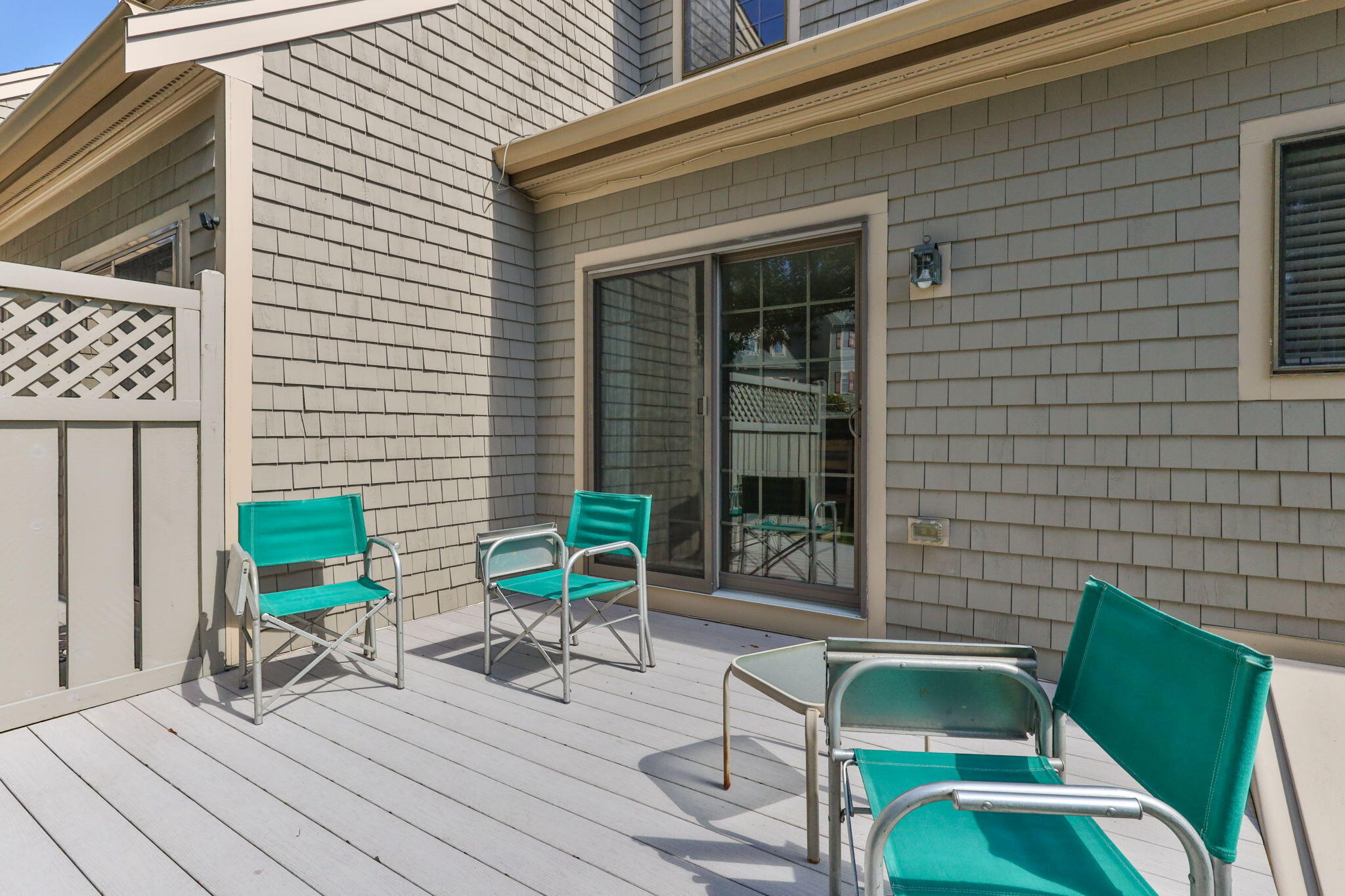 45 West Road, Unit 1E Orleans, MA 02653 - Photo 27 of 37 a view of a chairs with a table and chair in the balcony