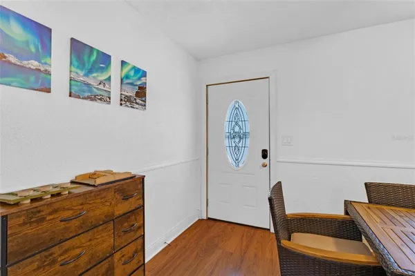 a living room with furniture and a gate