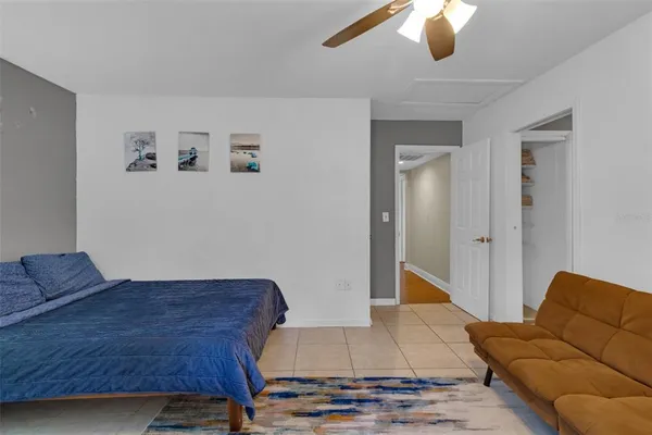 a bathroom with a sink toilet and a mirror