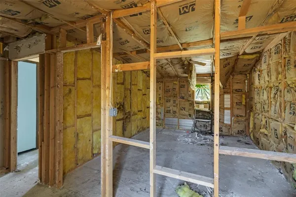 a view of livingroom with hardwood floor and ceiling fan
