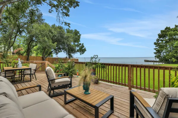 a view of a patio with two chairs and a table