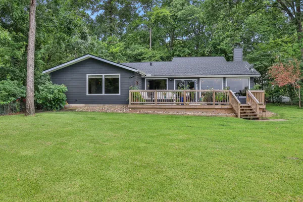 a front view of house with yard and porch
