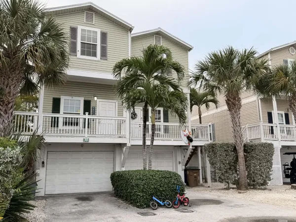 a front view of a house with balcony