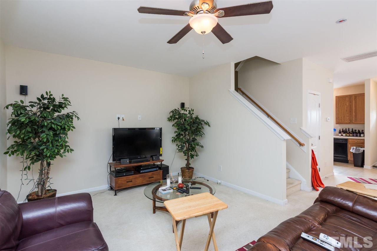 3515 Oneonta Avenue Raleigh, NC 27604 - Photo 9 of 13 a living room with furniture and a flat screen tv