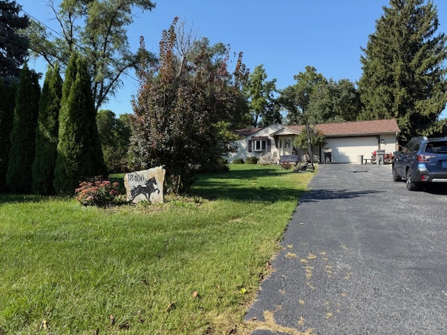 18400 South Parker Road Mokena, IL 60448 - Photo 4 of 31 a view of a house with backyard and sitting area