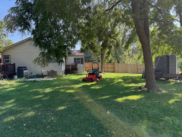 18400 South Parker Road Mokena, IL 60448 - Photo 7 of 31 a view of a backyard with a garden and trees