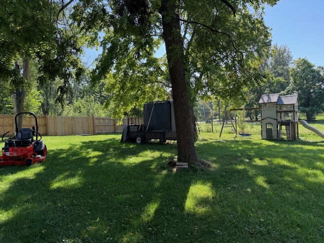18400 South Parker Road Mokena, IL 60448 - Photo 8 of 31 a backyard of a house with lots of green space