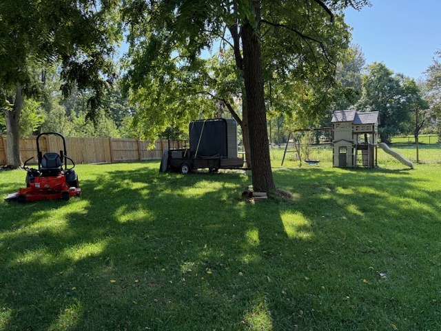18400 South Parker Road Mokena, IL 60448 - Photo 9 of 31 a view of a backyard with a small cabin