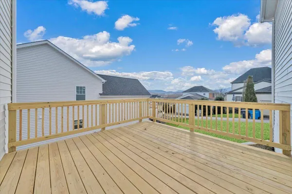 a view of swimming pool with deck and outdoor seating