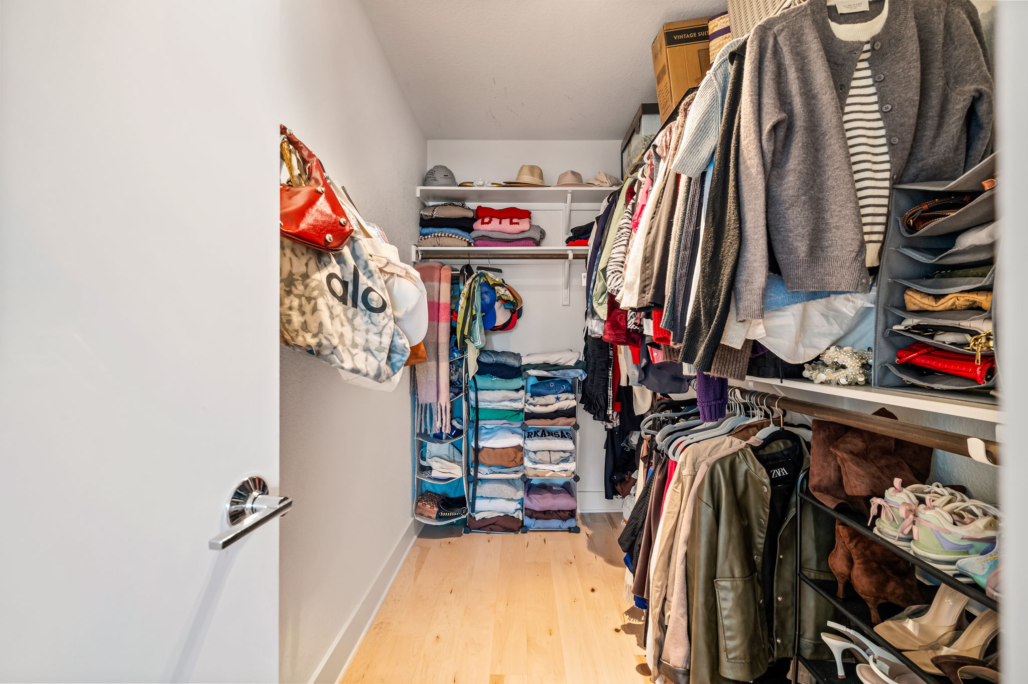 1124 Linden Street, Unit B Austin, TX 78702 - Photo 12 of 26 Walk in closet with light wood-type flooring