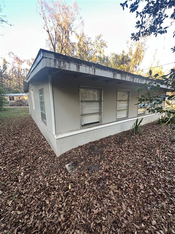 2435 North Junglecamp Road Inverness, FL 34453 - Photo 13 of 13 a backyard of a house with lots of green space