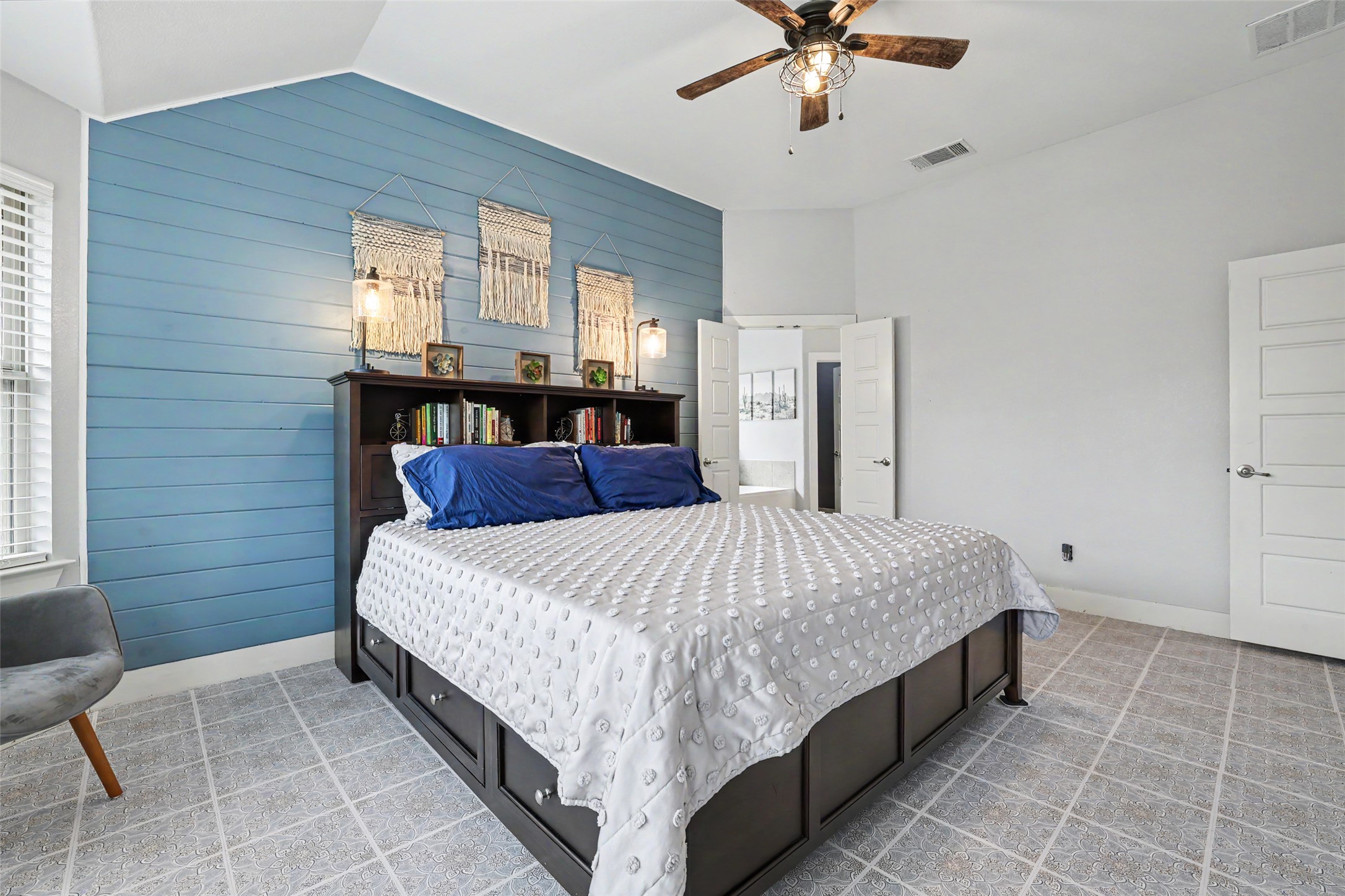 117 Rock Dock Road Georgetown, TX 78633 - Photo 24 of 38 a bedroom with a bed and window