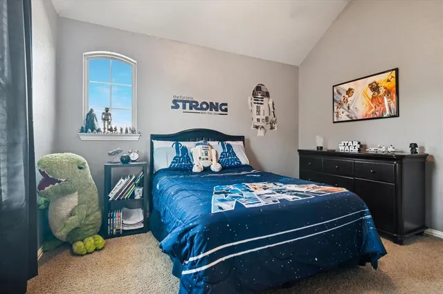 a bedroom with a bed and the furniture