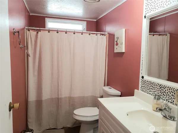 a bathroom with a sink and a toilet