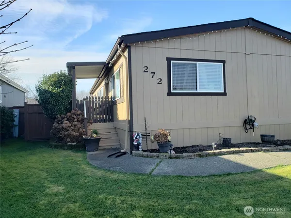 a house view with a garden space
