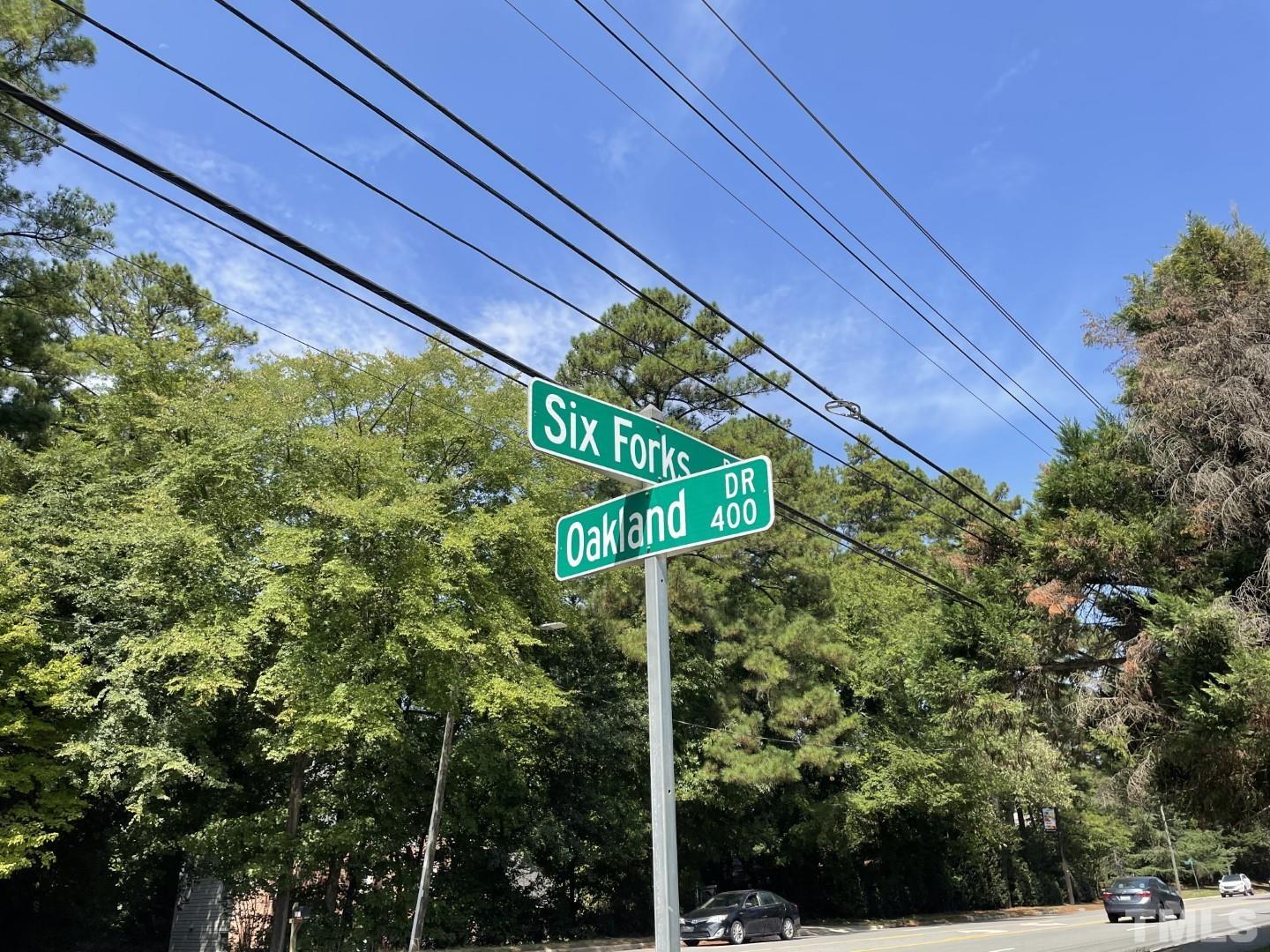 3300 Six Forks Road Raleigh, NC 27609 - Photo 11 of 12 a street sign on a pole on a street