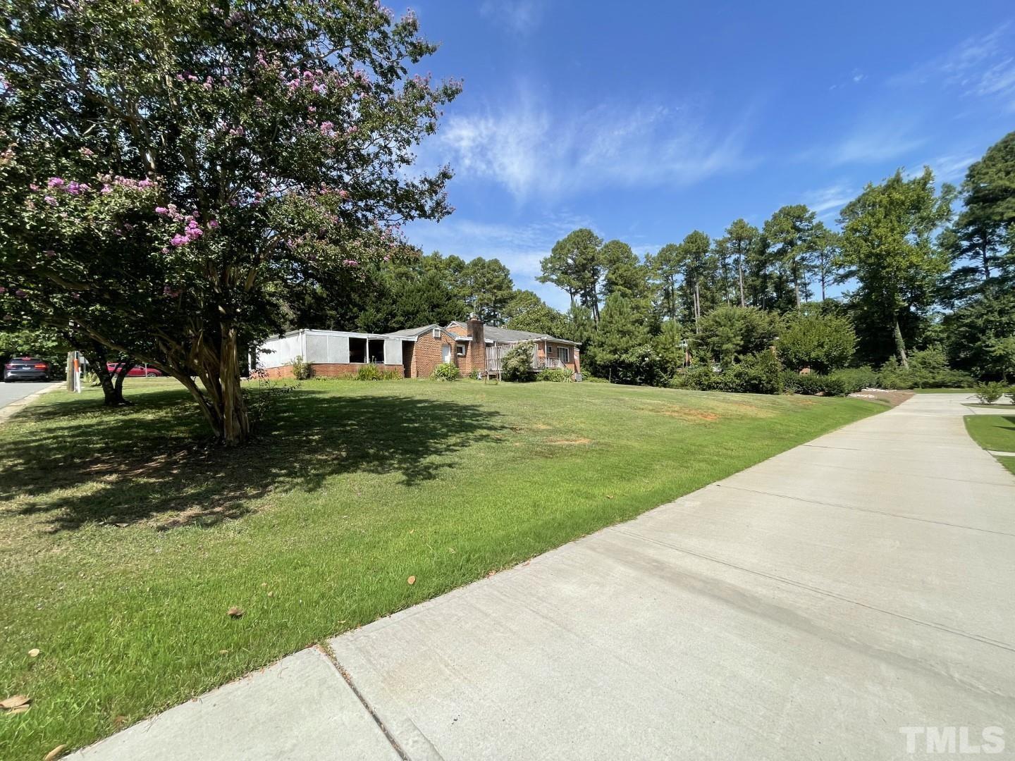 3300 Six Forks Road Raleigh, NC 27609 - Photo 6 of 12 a view of a park with large trees
