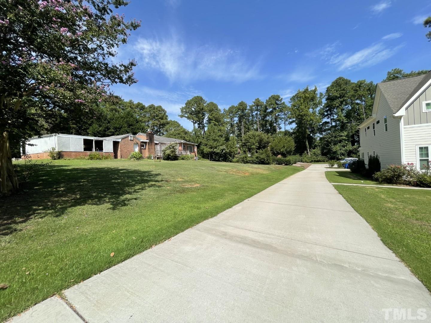 3300 Six Forks Road Raleigh, NC 27609 - Photo 7 of 12 a view of a house with a big yard