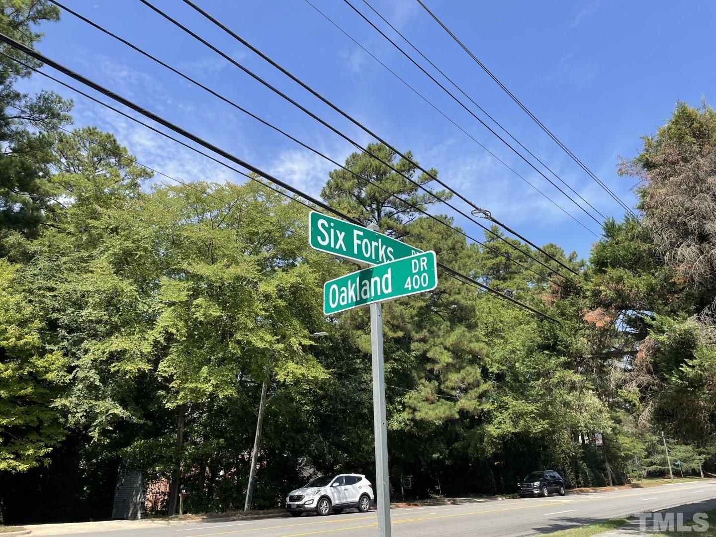 3300 Six Forks Road Raleigh, NC 27609 - Photo 10 of 12 a street sign on a pole on a street