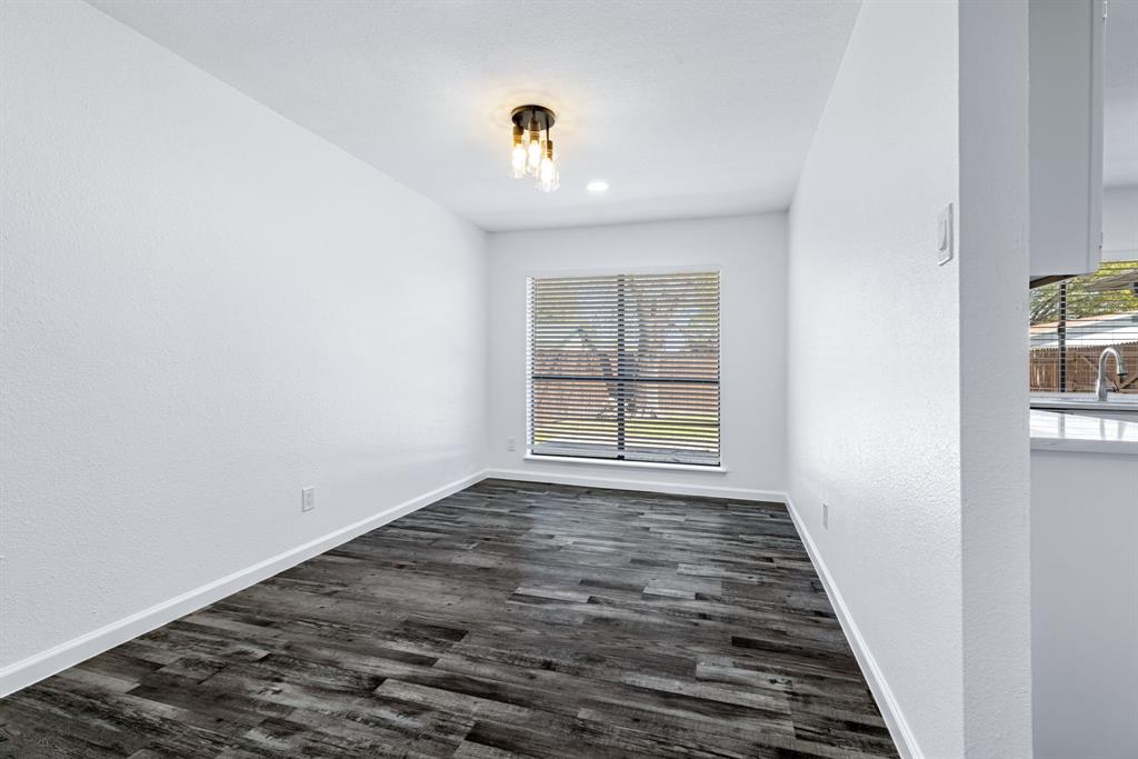 3429 Post Oak Road Garland, TX 75044 - Photo 14 of 36 an empty room with windows