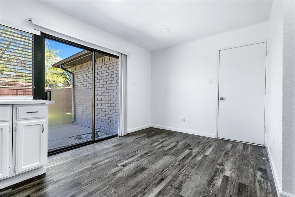 3429 Post Oak Road Garland, TX 75044 - Photo 22 of 36 an empty room with closet and mirror