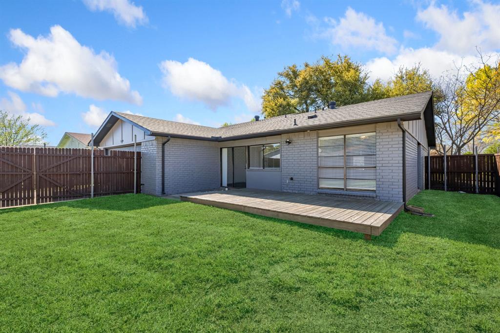 3429 Post Oak Road Garland, TX 75044 - Photo 36 of 36 a view of a backyard with a garden and entertaining space
