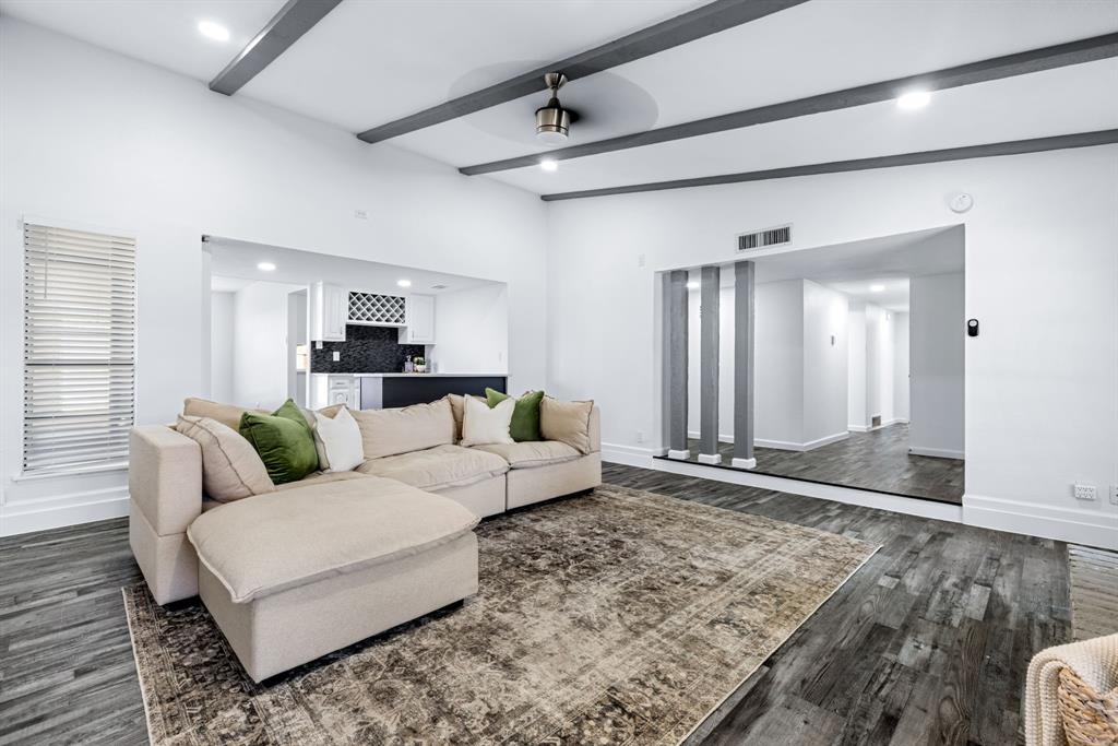 3429 Post Oak Road Garland, TX 75044 - Photo 6 of 36 a living room with furniture and wooden floor
