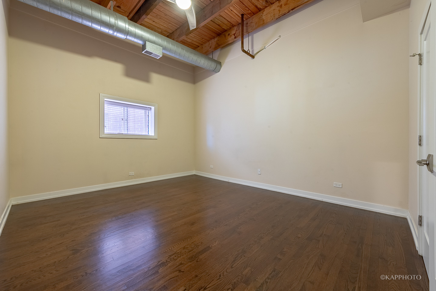 1141 West Madison Street, Unit 3 Chicago, IL 60607 - Photo 17 of 34 a view of a room with wooden floor