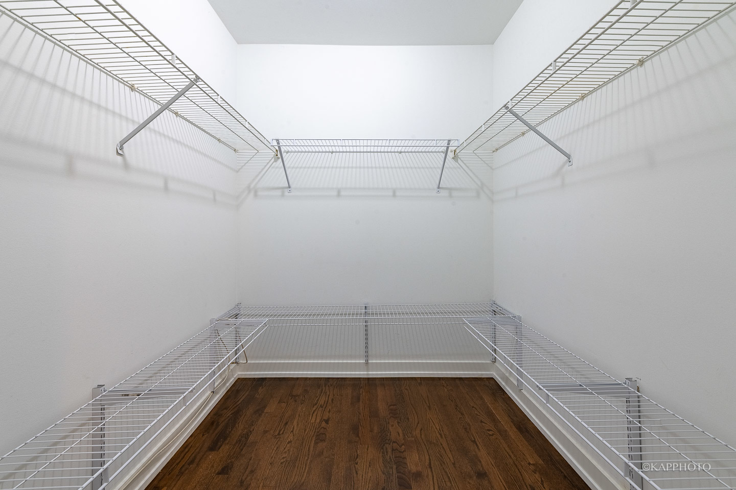 1141 West Madison Street, Unit 3 Chicago, IL 60607 - Photo 25 of 34 a view of a room with racks on the wall