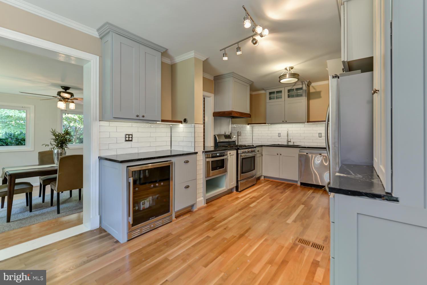 1811 August Drive Silver Spring, MD 20902 - Photo 11 of 38 Spacious kitchen with new hardwood floors