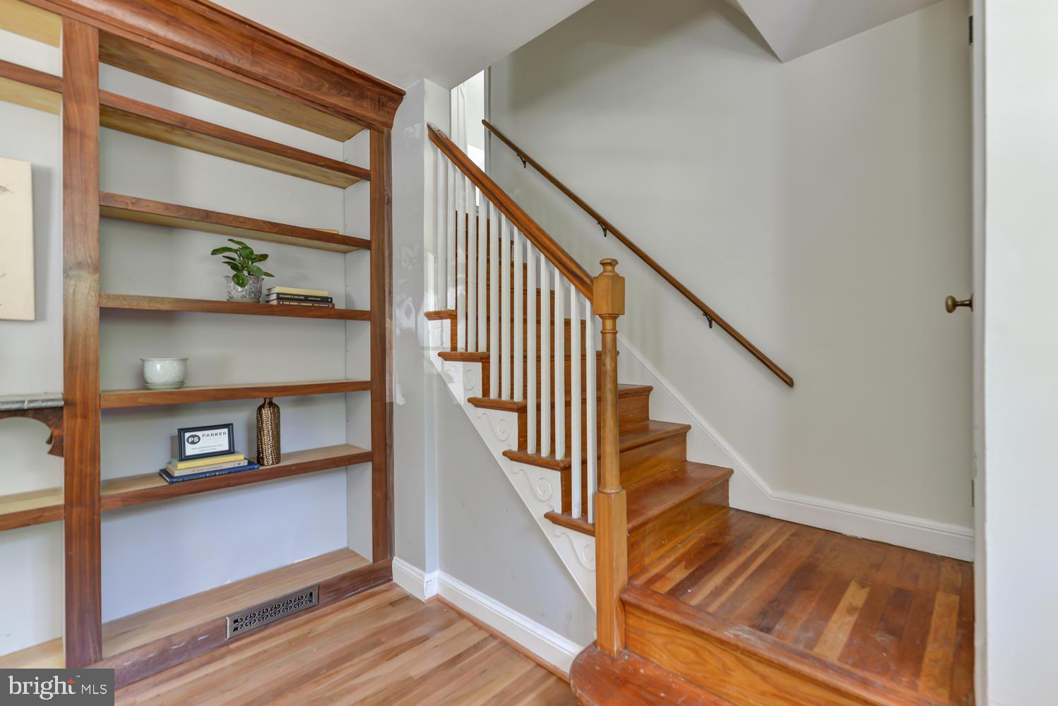 1811 August Drive Silver Spring, MD 20902 - Photo 23 of 38 Custom shelves built & Hardwood floors