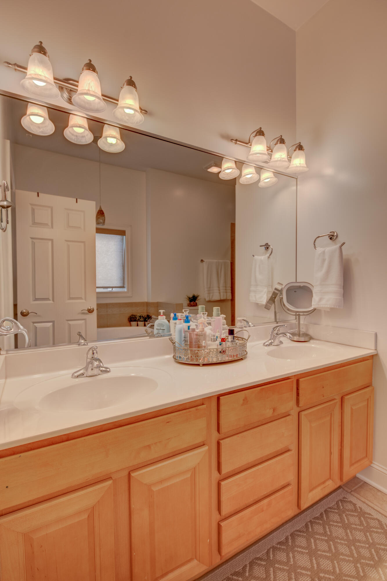 669 Davis Circle Crown Point, IN 46307 - Photo 11 of 22 a bathroom with a sink vanity and a mirror