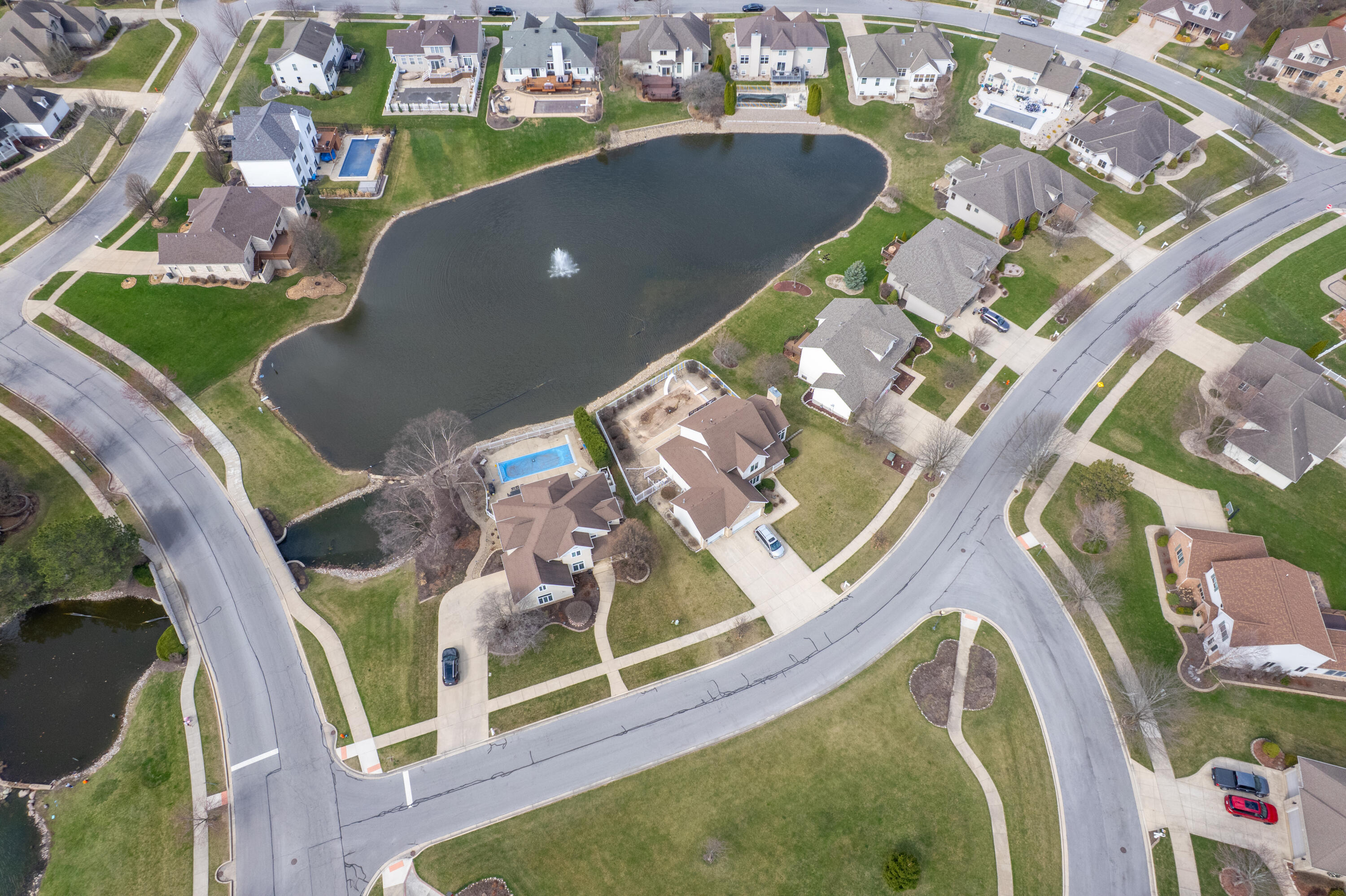 669 Davis Circle Crown Point, IN 46307 - Photo 21 of 22 an aerial view of a house with a swimming pool