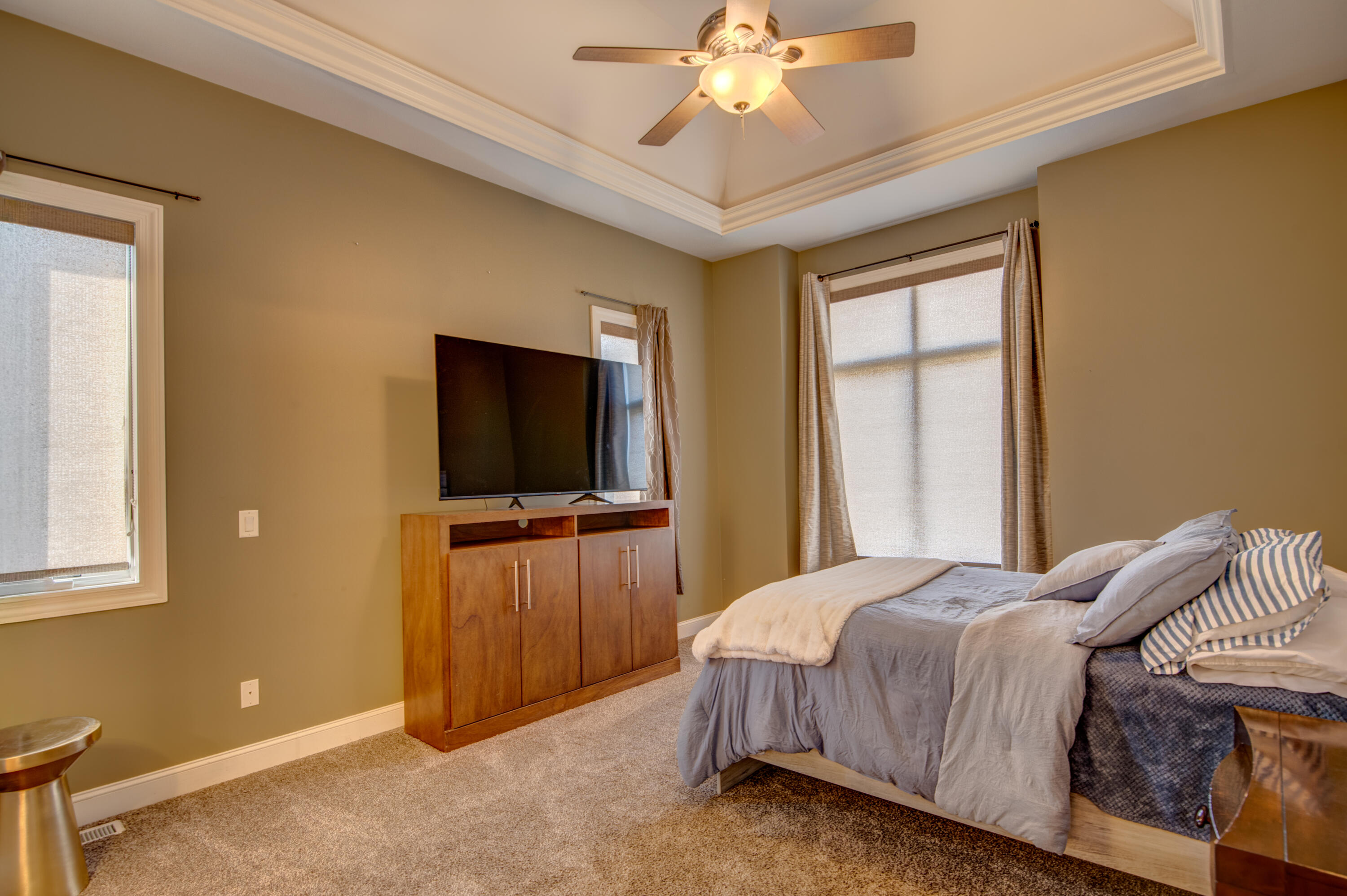 669 Davis Circle Crown Point, IN 46307 - Photo 10 of 22 a bedroom with a bed and a flat screen tv