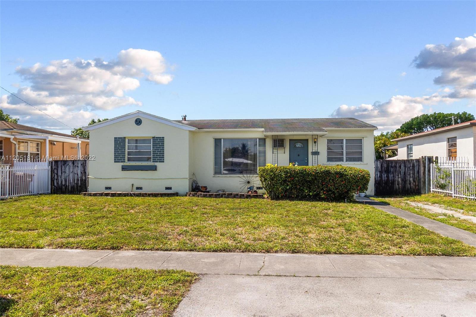 170 West 58th Street Hialeah, FL 33012 - Photo 2 of 12 a view of a house with a patio