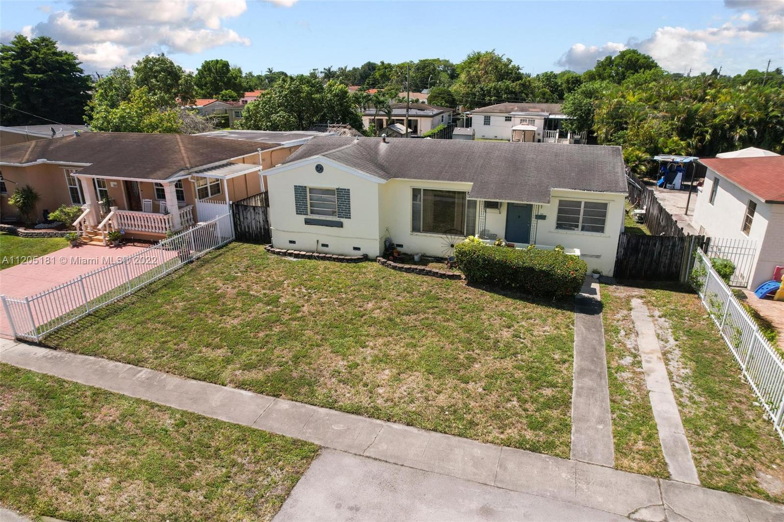 170 West 58th Street Hialeah, FL 33012 - Photo 5 of 12 a view of house with yard