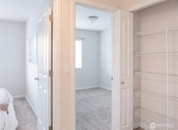 a view of a bathroom with a glass door